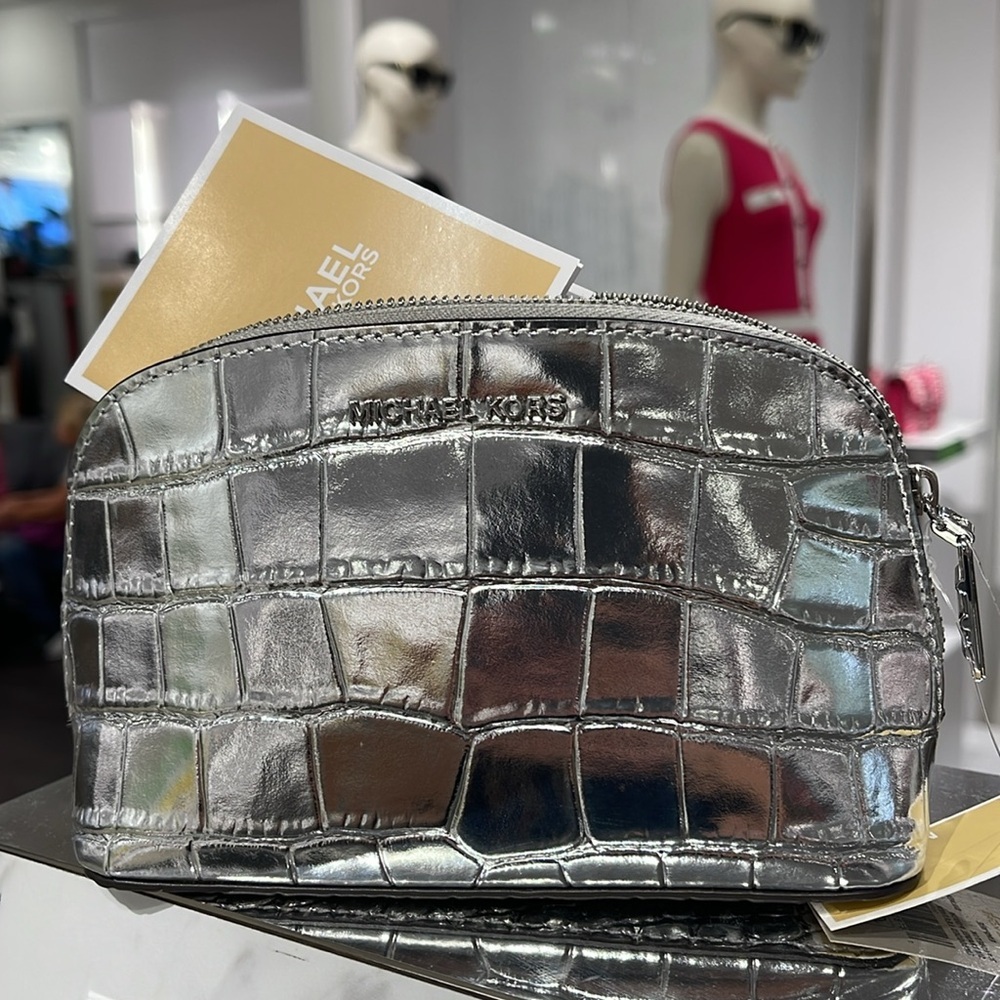 Michael Kors Empire Sm Metallic Crocodile Embossed Leather Travel Pouch
Silver - Picture 13 of 16